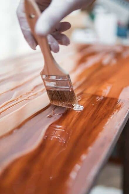 applying stain to wood